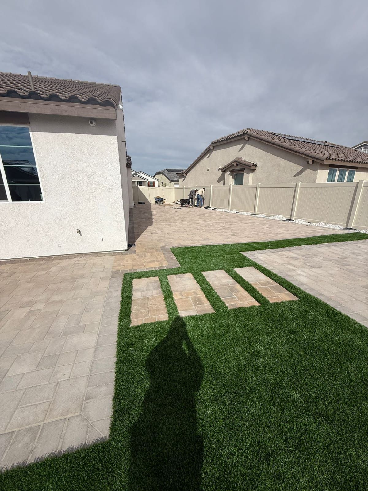 Backyard Turf With Paver Stepping Stones