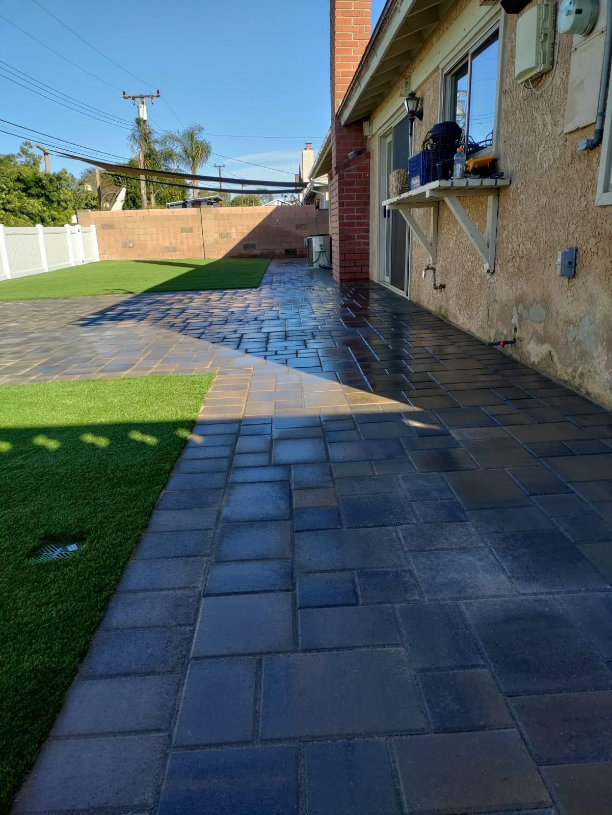 Charcoal Interlocking Pavers With Turf Border