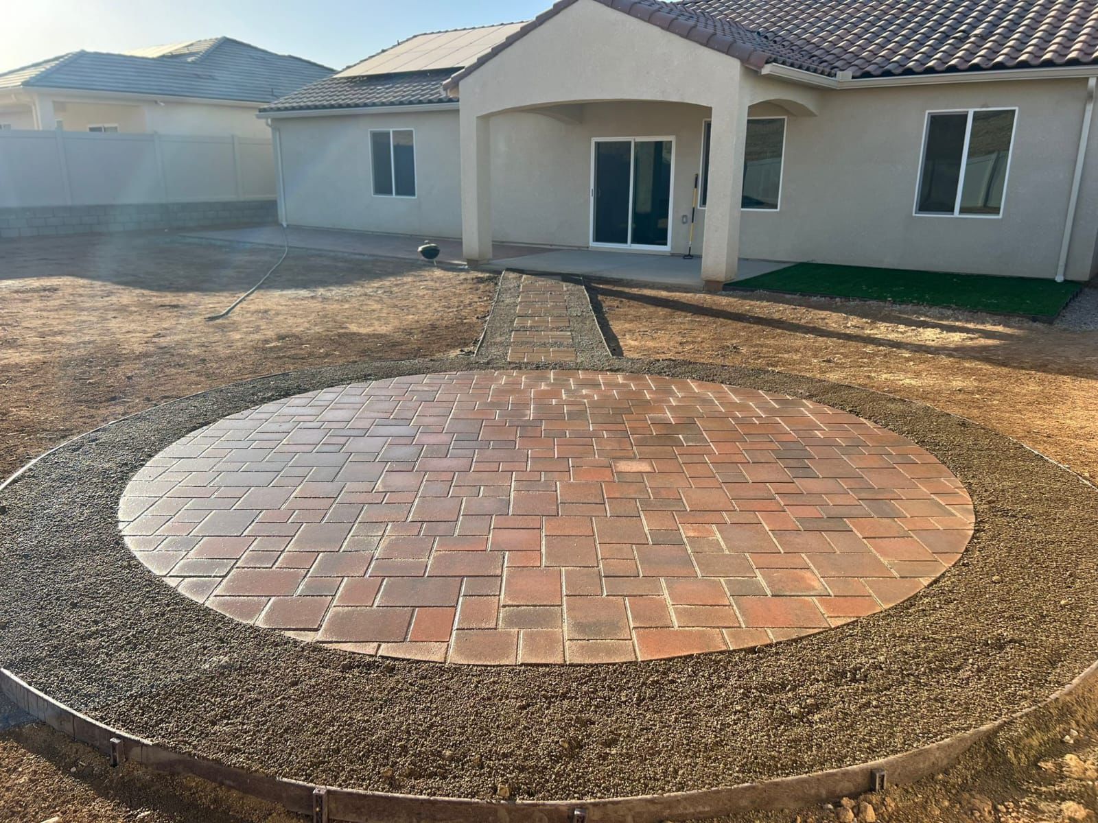 Circular Brick Paver Patio Under Construction