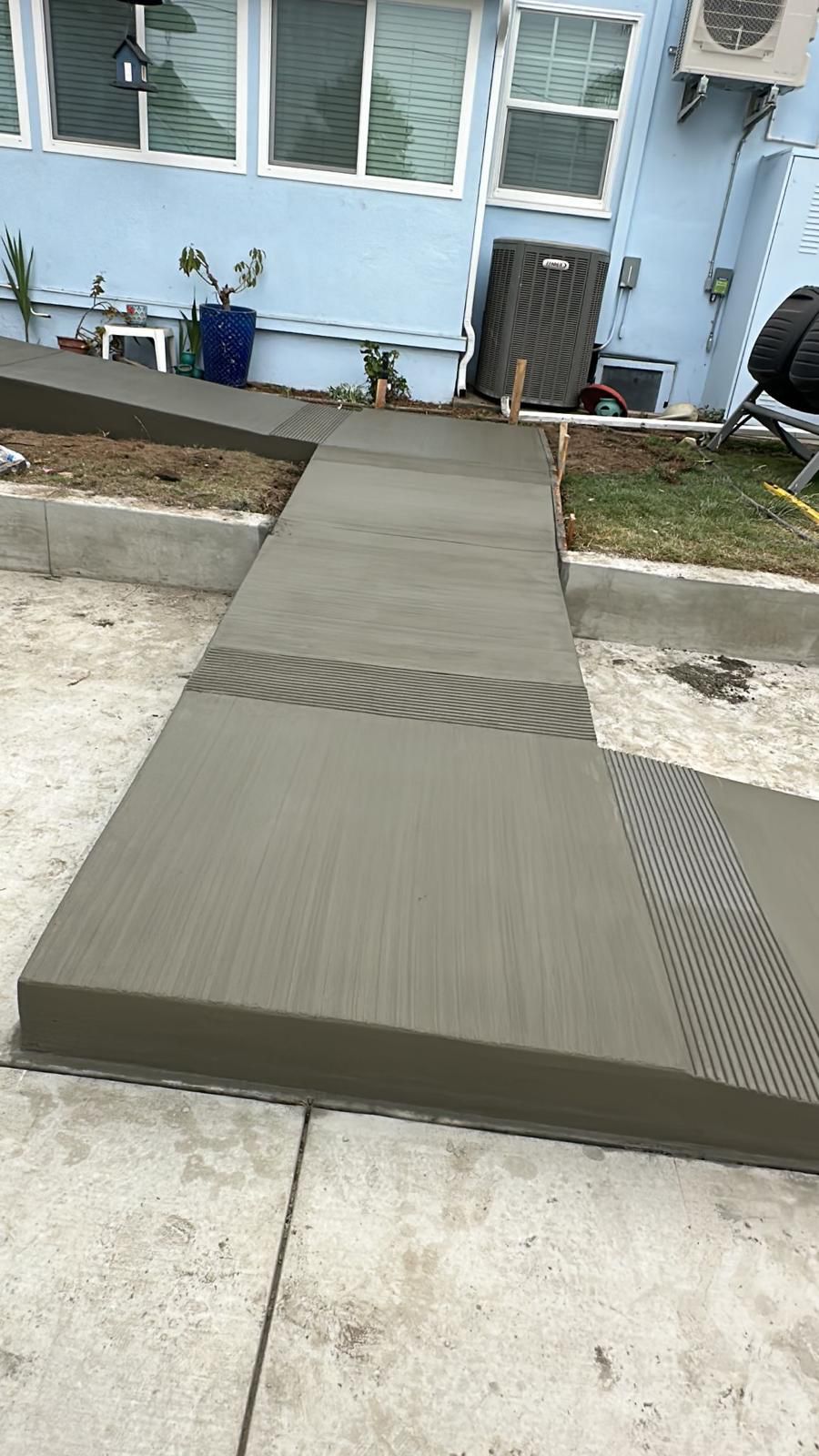 New Concrete Walkway and Steps With Broom Finish